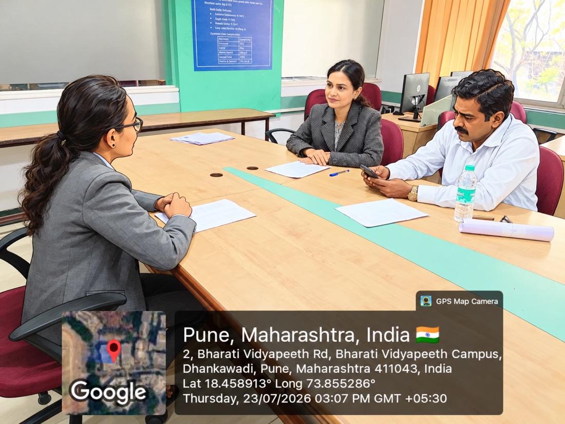 Discussing a student project proposal during a panel review session